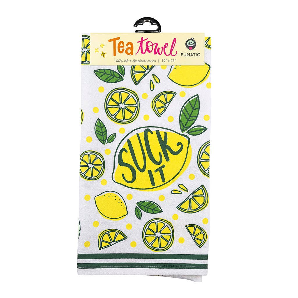 Cotton tea towel with the image of a lemon in the middle surrounded by sliced lemons. In the middle is written "Suck It"